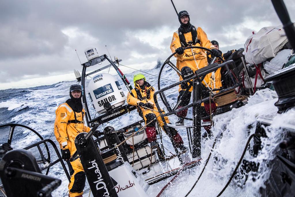 March 30, 2015. Leg 5 to Itajai onboard Abu Dhabi Ocean Racing. Day 14.  Louis Sinclair, Luke ``Parko`` Parkinson, Phil Harmer, and skipper Ian Walker test the cold wet conditions 100 nm from Cape Horn in large seas. photo copyright Matt Knighton/Abu Dhabi Ocean Racing taken at  and featuring the  class