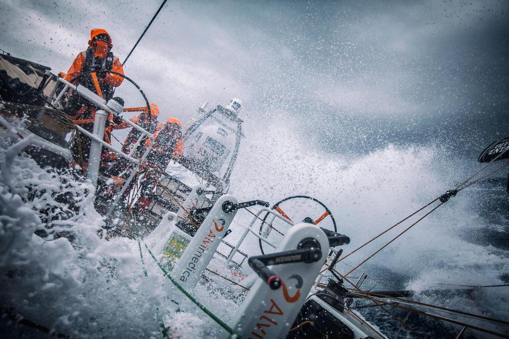 March 24, 2015. Leg 5 to Itajai onboard Team Alvimedica. Day 6. A late night gybe set off a wild day of true Southern Ocean sailing as the temps dropped and the wind and waves built with an approaching low pressure system and accompanying cold front. Stu Bannatyne driving in windy downwind conditions while pushing through an incoming Southern Ocean cold front. ©  Amory Ross / Team Alvimedica