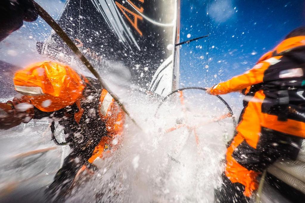 Team Alvimedica - Protecting yourself from the sheer volume of water over the deck is a priority, and most often accomplished by simply leading with your back. Even then--water is powerful and you can easily get knocked down. ©  Amory Ross / Team Alvimedica