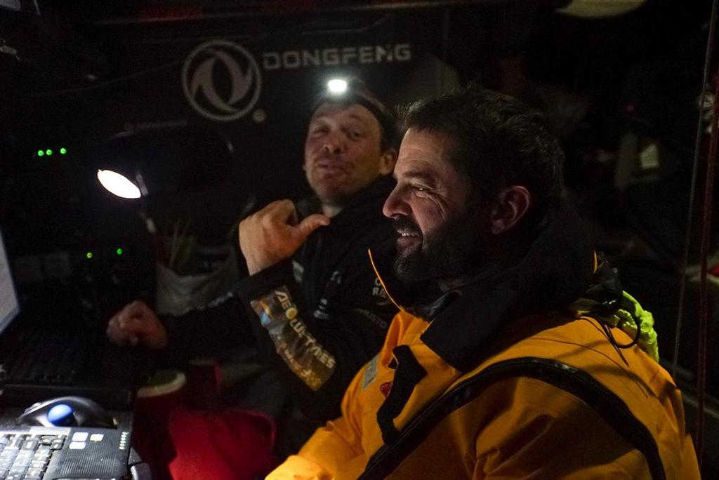 March 29, 2015. Leg 5 onboard Dongfeng Race Team. Pascal Bidegorry and Kevin Escoffier joking at the Nav Station. Crew still in good shape and very good mood! © Yann Riou / Dongfeng Race Team