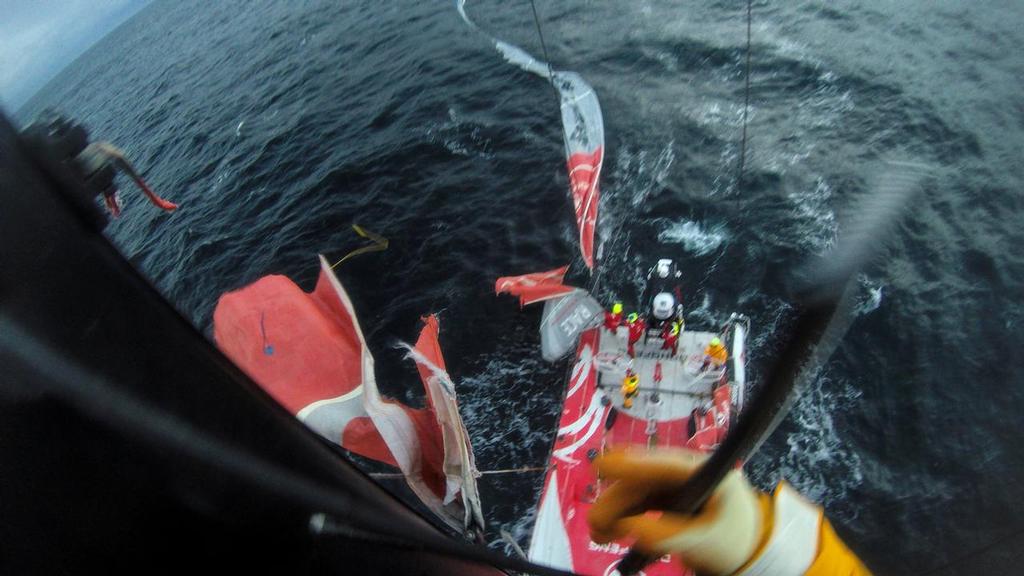 March 31, 2015. Leg 5 onboard Dongfeng Race Team. Kevin Escoffier cuts the broken part of the mast as the team enters the Beagle channel on its way to Ushuaia. © Yann Riou / Dongfeng Race Team