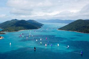 Some of the yachts at Audi Hamilton Island Race Week 2014 weave their way through the islands bordering the Whitsunday Passage. photo copyright  Andrea Francolini / Audi http://www.afrancolini.com taken at  and featuring the  class