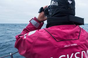 Onboard Team SCA - Stacey Jackson with the binoculars pointing at Dongfeng at the horizon - Leg five to Itajai - Volvo Ocean Race 2015 photo copyright Anna-Lena Elled/Team SCA taken at  and featuring the  class