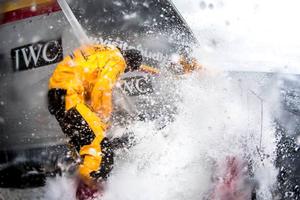 Onboard Abu Dhabi Ocean Racing - Louis Sinclair prepares to take on a wave that has already engulfed Justin Slattery on the bow during a sail change in the southern ocean - Leg five to Itajai - Volvo Ocean Race 2015 photo copyright Matt Knighton/Abu Dhabi Ocean Racing taken at  and featuring the  class