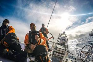 Onboard Team Alvimedica - Mark Towill and Charlie Enright enjoying the warmth of a Southern Ocean sun together, after years of dreaming about it - Leg five to Itajai - Volvo Ocean Race 2015 photo copyright  Amory Ross / Team Alvimedica taken at  and featuring the  class