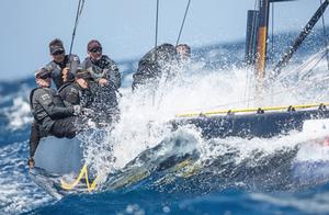 Team Nika plow through a wave as they race downwind photo copyright MartinezStudio.es taken at  and featuring the  class
