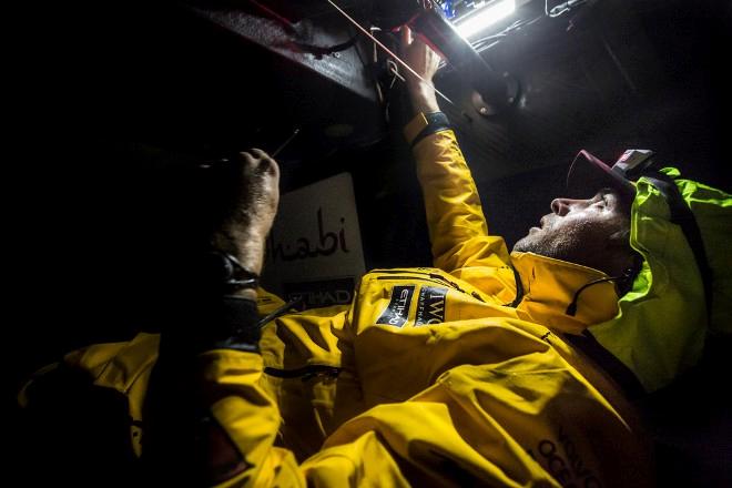 Leg six Newport onboard Abu Dhabi Ocean Racing. Day three. Daryl Wislang repairs the outhaul hydraulics in the middle of the night before a tack. - Volvo Ocean Race 2015 © Matt Knighton/Abu Dhabi Ocean Racing