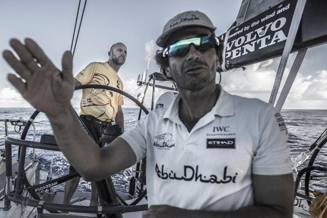 Leg six Newport onboard Abu Dhabi Ocean Racing. Day five. Roberto Bermudez 'Chuny' gives wind input to Ian Walker at the helm in the morning as they try to catch up to the rest of the fleet in light winds. - Volvo Ocean Race 2015 © Matt Knighton/Abu Dhabi Ocean Racing