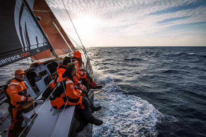 April 3,2015. Leg 5 to Itajai onboard Team Alvimedica. Day 16. A light morning gives the team a chance to catch their breath and dry out the boat,only before another 36 hours of forecasted heavy winds to return. Abu Dhabi crosses on the horizon ahead by two miles,bringing everyone to the rail before a tack to follow.  ©  Amory Ross / Team Alvimedica