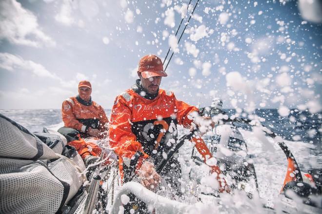 Leg six to Newport onboard Team Alvimedica. Day 10. True tradewind sailing in 20-25 knots and warm tropical water has everyone smiling,despite occupying the rear of the fleet. Alberto Bolzan driving in ideal downwind conditions through the tropics. - Volvo Ocean Race 2015 ©  Amory Ross / Team Alvimedica