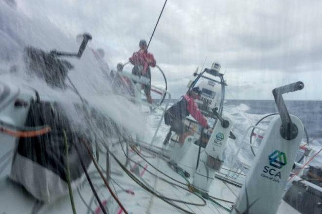 Onboard Team SCA – A wave crashes over the boat and into cockpit - Leg six to Newport – Volvo Ocean Race 2015 © Corinna Halloran / Team SCA