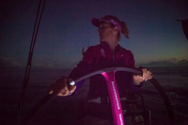 Leg six to Newport onboard Team SCA. Day five. Carolijn Brouwer looks over she shoulder at Team Brunel shortly after sunset. - Volvo Ocean Race 2015 © Corinna Halloran / Team SCA