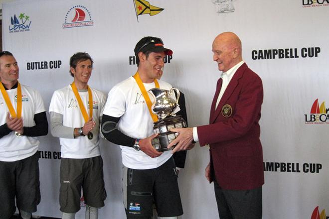2011 Trophy Presentation - with Simone Ferrarese and Bill Ficker. Ferrarese sailed his way into Congressional Cup in 2011- and went on to win it in 2013  © Jo Murray