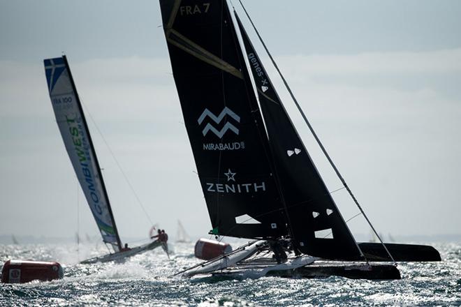 Spindrift racing's Diam 24 (Spindrift Black) skippered by Yann Guichard captured during the first day of races in the SPI Ouest regatta © Chris Schmid