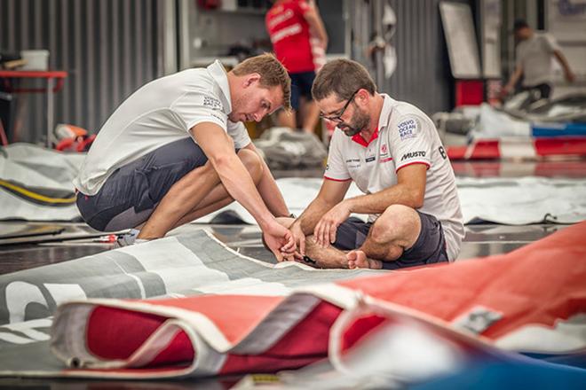 Pascal and Martin work closely together on the sails © Dongfeng Race Team