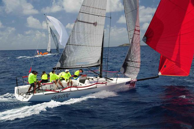 A superb day for the Melges 32s. Sergio Sagramoso's Puerto Rican Lazy Dog  and Jaime Torres' Smile and Wave enjoy perfect racing conditions © Todd VanSickle / BVI Spring Regatta http://www.bvispringregatta.org