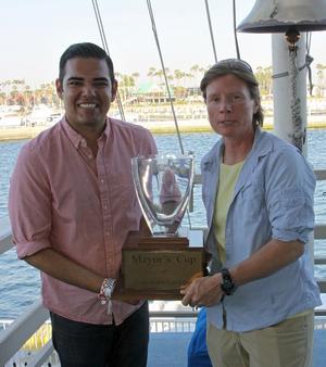 Nicole Breault receives the perpetual Mayor’s Cup trophy from City of Long Beach Mayor Robert Garcia for winning the ISAF Grade 3 match race. - 2015 Mayor’s Cup photo copyright Long Beach Yacht Club http://www.lbyc.org taken at  and featuring the  class