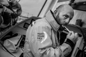 Leg six Newport onboard Abu Dhabi Ocean Racing. Day three. Skipper Ian Walker steals a minute on deck for some oral hygiene. - Volvo Ocean Race 2015 photo copyright Matt Knighton/Abu Dhabi Ocean Racing taken at  and featuring the  class