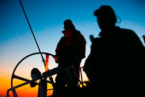  Leg 5 to Itajai onboard Team Alvimedica. Day 17. Stu Bannatyne (L) and Ryan Houston (R) on deck at sunset. The strong winds begin to subside as the fleet compresses on the southern limit of a high pressure system near Itajai,guaranteeing a close finish in 400 miles for places 1 through 4,all within sight of each other. - Volvo Ocean Race 2015 photo copyright  Amory Ross / Team Alvimedica taken at  and featuring the  class