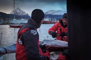 Onboard Dongfeng Race Team - Martin Stromberg and Eric Peron working on a sail in Ushuaia - Leg five to Itajai -  Volvo Ocean Race 2015 photo copyright Yann Riou / Dongfeng Race Team taken at  and featuring the  class