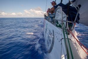 Leg six to Newport onboard Team SCA. Day five. Dee Caffari and Sam Davies sit on the bow and look to windward at Brunel. - Volvo Ocean Race 2015 photo copyright Corinna Halloran / Team SCA taken at  and featuring the  class