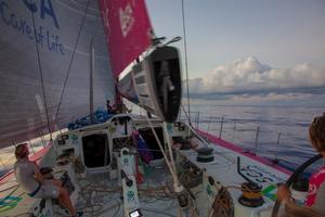 Leg six to Newport onboard Team SCA. Day five. Carolijn Brouwer and Liz Wardley manouver Team SCA through light fickle winds at sunset. - Volvo Ocean Race 2015 photo copyright Corinna Halloran / Team SCA taken at  and featuring the  class