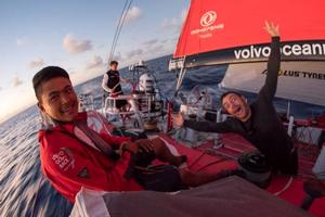 Onboard Dongfeng Race Team – Liu Xue 'Black' and Eric Peron's morning salute - Leg six to Newport – Volvo Ocean Race 2015 photo copyright  Sam Greenfield / Volvo Ocean Race taken at  and featuring the  class