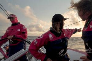 Onboard Team SCA – Sophie Ciszek points out Abu Dhabi Ocean Racing on the horizon to Abby Ehler during a watch change - Leg six to Newport – Volvo Ocean Race 2015 photo copyright Corinna Halloran / Team SCA taken at  and featuring the  class
