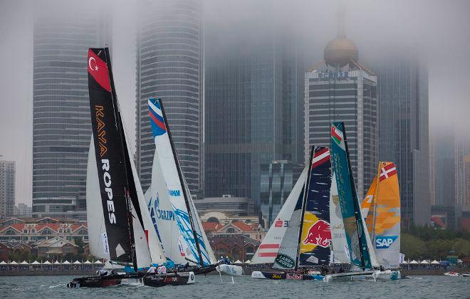 The fog lifted just enough for the Extreme 40s to take to the Fushan Bay racecourse on day two, following yesterday's cancelled racing. - Act 3, Qingdao 2015 - Day two © Lloyd Images
