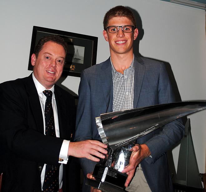 RYCT Commodore Richard Batt present Jock Calvert with the Commodore's Trophy for the most outstanding youthful particpant over the past season. © Peter Campbell