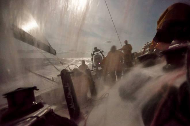Leg six Newport onboard Abu Dhabi Ocean Racing. The crew takes a wave during a sail change in the moonlight passing through the Gulf Stream. - Volvo Ocean Race 2015 © Matt Knighton/Abu Dhabi Ocean Racing