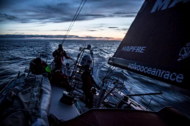Leg 7 to Lisbon onboard MAPFRE. Day 03. Iker Martinez,Antonio Cuervas-Mons '„eti' and Willy Altadill on the late watch with the sun going down. - Volvo Ocean Race 2015 © Francisco Vignale/Mapfre/Volvo Ocean Race