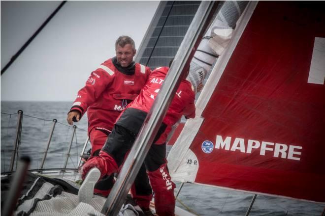 Leg 7 to Lisbon onboard MAPFRE. Day 08. MH0 coming down,Rob Greenhalgh and Willy Altadil are there to catch it and bag it. - Volvo Ocean Race 2015 © Francisco Vignale/Mapfre/Volvo Ocean Race