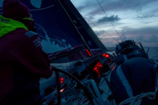 Leg 6 to Newport onboard Team SCA. Day 15. Annie Lush helms during the 'blue hour' shortly after sunset.  © Corinna Halloran / Team SCA