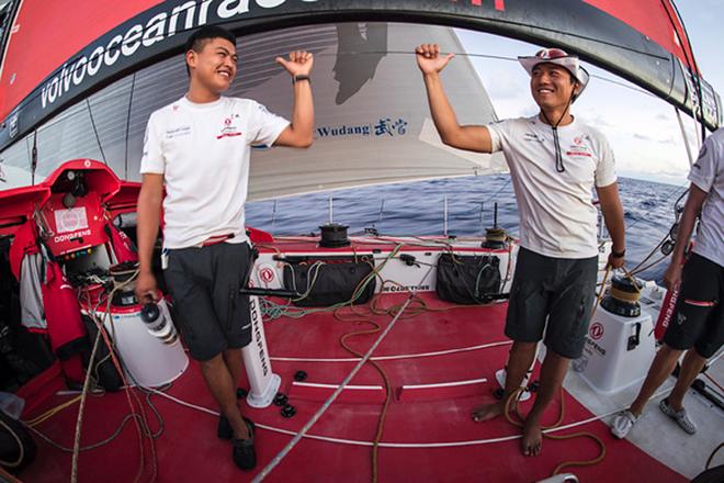Day 4. Liu Xue 'Black' and Jin Hao Chen 'Horace' enjoying a conversation that no one else onboard understands. © Sam Greenfield/Dongfeng Race Team/Volvo Ocean Race