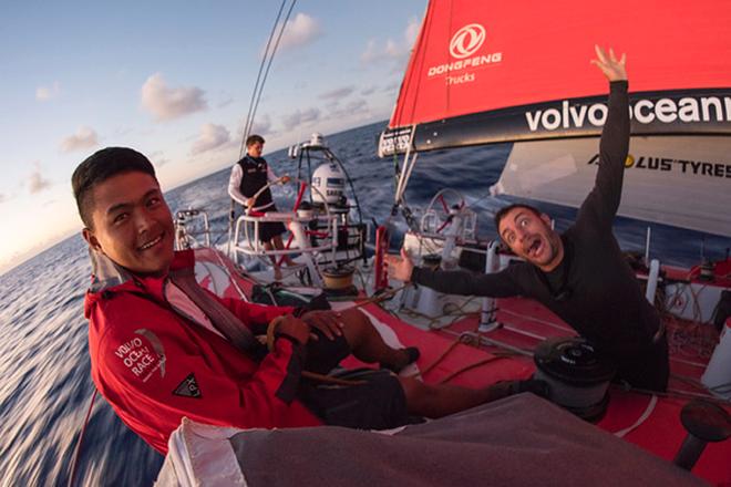 Day 6. Liu Xue 'Black' and Eric Peron's morning salute. © Sam Greenfield/Dongfeng Race Team/Volvo Ocean Race