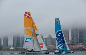 SAP Extreme Sailing Team and The Wave, Muscat sail through the fog towards the city - Act 3, Qingdao 2015 - Day two photo copyright Lloyd Images taken at  and featuring the  class