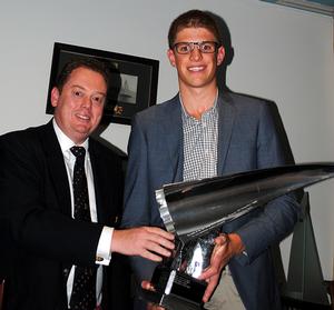 RYCT Commodore Richard Batt present Jock Calvert with the Commodore's Trophy for the most outstanding youthful particpant over the past season. photo copyright Peter Campbell taken at  and featuring the  class