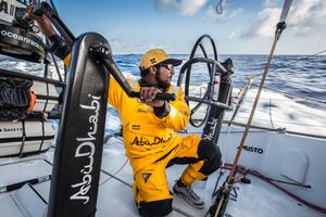  Leg 6 to Newport onboard Abu Dhabi Ocean Racing. Day 11. Adil Khalid looks out over the horizon for signs of Dongfeng. photo copyright Matt Knighton/Abu Dhabi Ocean Racing taken at  and featuring the  class