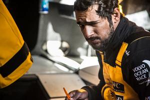 Leg 7 to Lisbon onboard Abu Dhabi Ocean Racing. Day 1. Adil Khalid winces in the midst of seasickness in the middle of the Atlantic Ocean. photo copyright Matt Knighton/Abu Dhabi Ocean Racing taken at  and featuring the  class