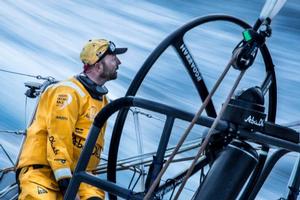 Leg 7 to Lisbon onboard Abu Dhabi Ocean Racing. Day 4. Ian Walker sits to leeward to look at MAPFRE around the headsail checking to see if the team has gained bearing as night falls. - Volvo Ocean Race 2015 photo copyright Matt Knighton/Abu Dhabi Ocean Racing taken at  and featuring the  class