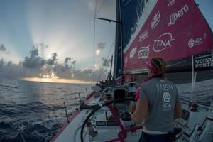 Leg 6 to Newport onboard Team SCA. Day 14. Annie Lush helms through the light winds of the cold front's transition zone photo copyright Corinna Halloran - Volvo Ocean Race http://www.volvooceanrace.com taken at  and featuring the  class