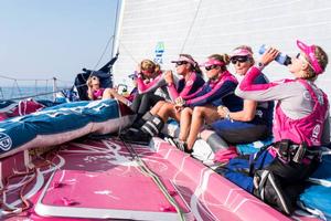 Leg 7 to Lisbon onboard Team SCA. Day 00. Light winds. The crew takes a break on the foredeck between the tacks. - Volvo Ocean Race 2015 photo copyright Anna-Lena Elled/Team SCA taken at  and featuring the  class