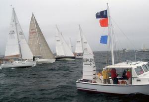 Marion Bermuda racers line up for a windward start. There is only one way to Bermuda... 645 miles SSE out of Buzzard's Bay, across the Gulf Stream and on to the finish off St David's Head.  - Marion Bermuda Race 2015 photo copyright Talbot Wilson taken at  and featuring the  class