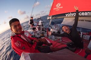Day 6. Liu Xue 'Black' and Eric Peron's morning salute. photo copyright Sam Greenfield/Dongfeng Race Team/Volvo Ocean Race taken at  and featuring the  class