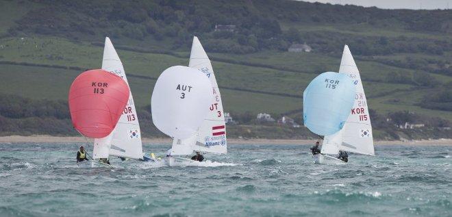 Mens two person Dinghy (470) fleet on day one - ISAF Sailing World Cup Weymouth and Portland © onEdition http://www.onEdition.com