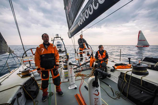 June 8,2015. Leg 8 to Lorient onboard Team Alvimedica. Day 1. MAPFRE drifts nearby at sunrise after an eventful night of tricky sailing,with fickle winds and clouds making life unpredictable and tough. A tricky night of choices,most notably whether to sail north inshore along the coast or further offshore to the west,was made tougher by persistently light conditions and clouds.  ©  Amory Ross / Team Alvimedica