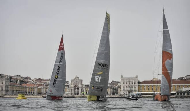 Start of Leg 8 from Lisbon to Lorient: Dongfeng Race Team,Team Brunel and Team Alvimedica,trying to get some wind in front of Praa do ComŽrcio. - Volvo Ocean Race 2015 © Ricardo Pinto / Volvo Ocean Race