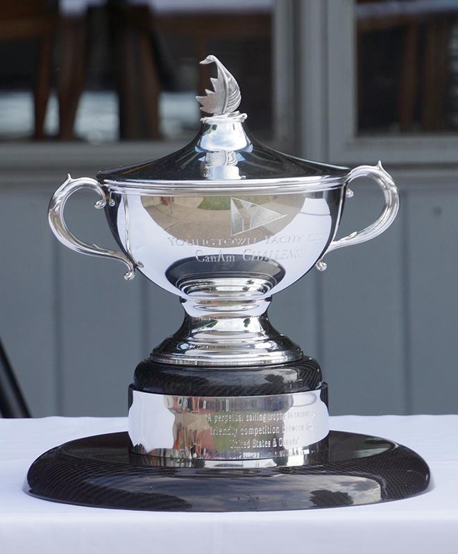 The CanAm Challenge Cup.  What makes this trophy truly “CanAm” is that the cup was commissioned by Boardman Silver in Connecticut and the carbon fiber base was donated by Rossi Milev of  Clear Air out of the Greater Toronto Area © Amy Reynolds