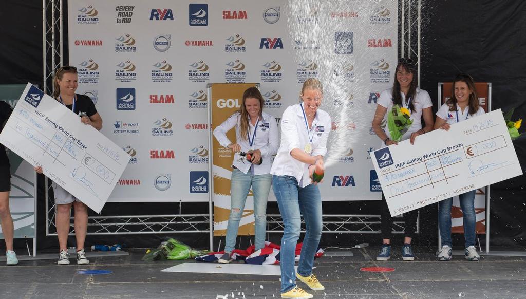 Jo Aleh and Polly Powrie, NZL,  Hannah Mills and Saskia Clark, GBR and Tina Mrak and Veronika Macarol, SLO, Women's Two Person Dinghy (470) prize giving on day five of the ISAF Sailing World Cup Weymouth & Portland. © onEdition http://www.onEdition.com